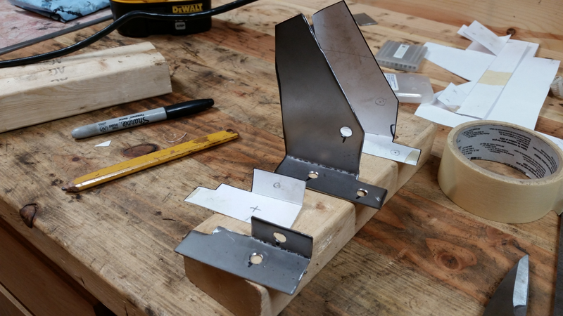 The holes that correspond to vague circles on the templates were intended for plug welds, I used the one on the smaller patch but on the larger it was in a very thin spot so I ended up skipping it. Weight reduction!